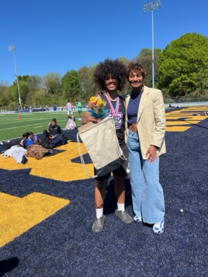 Anna Cockrell poses with a student