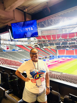 Dr. Terza Lima Neves inside the stadium