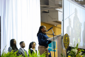 Zoe Migioni speaking at the Honors Convocation