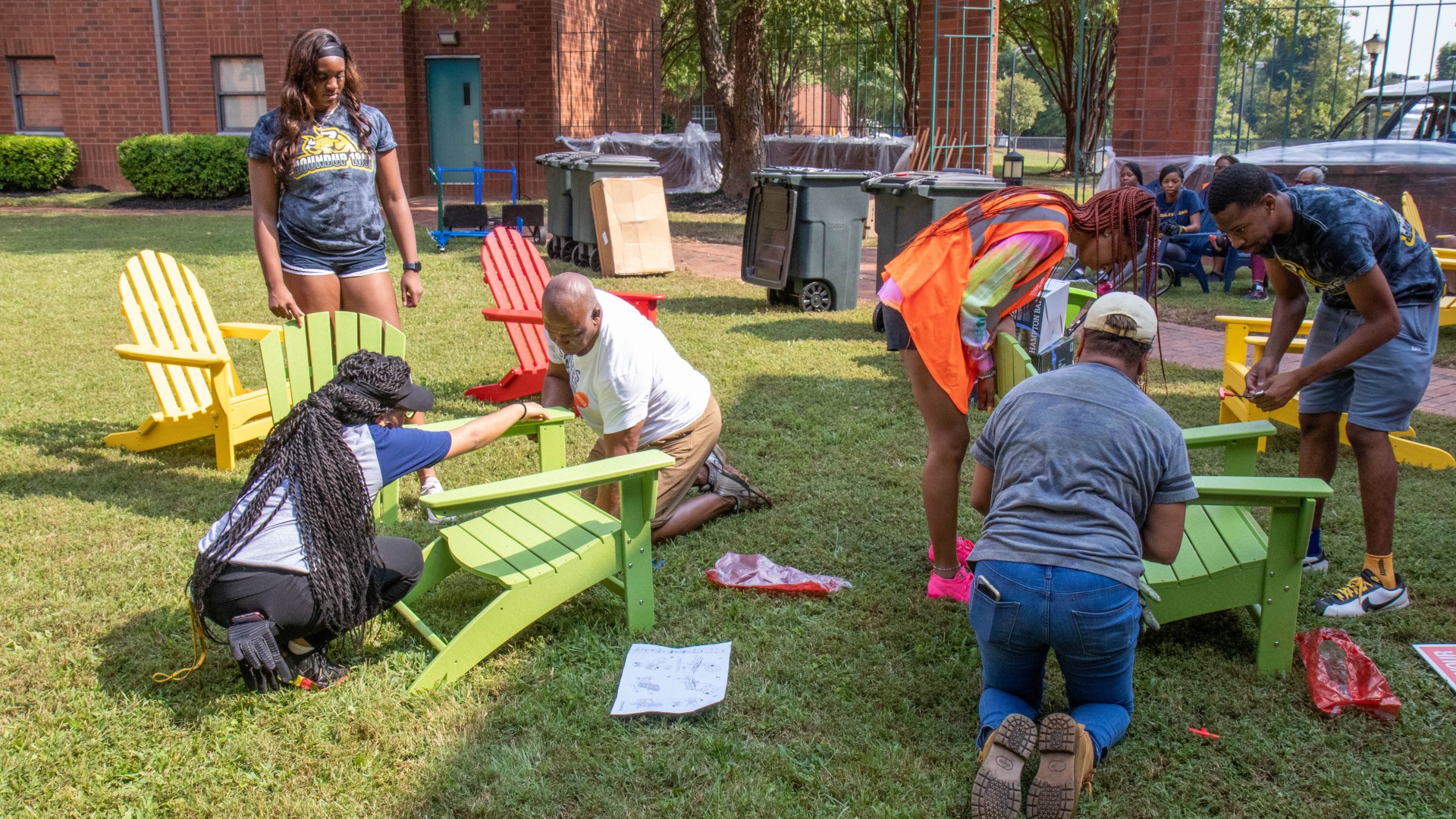 Volunteers assembling benches