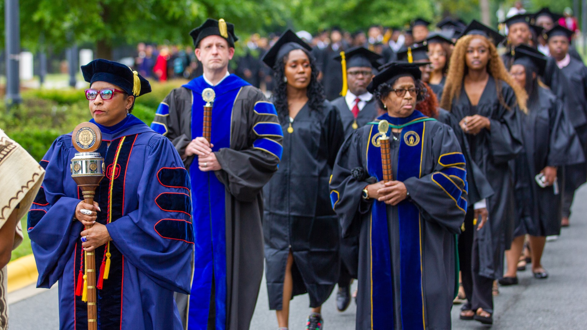 Marshalls leading the procession across campus for Baccalaureate 2023.