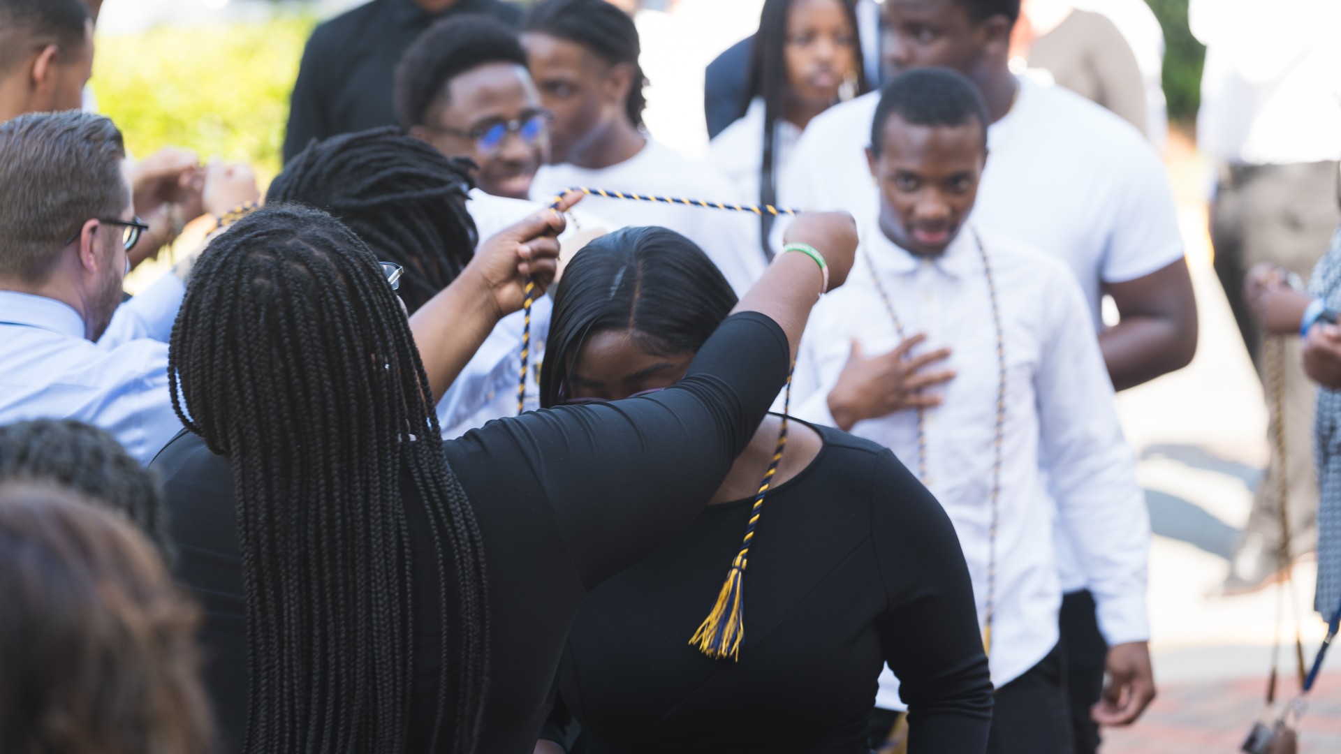 Freshmen were given their cords as they entered Jane M. Smith Church