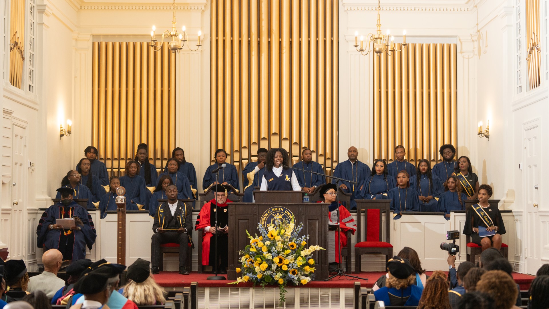 SGA President and Political Science Major Sidle Fleurimond '24 gives a greeting from the Student Government Association during Freshman Convocation 2023