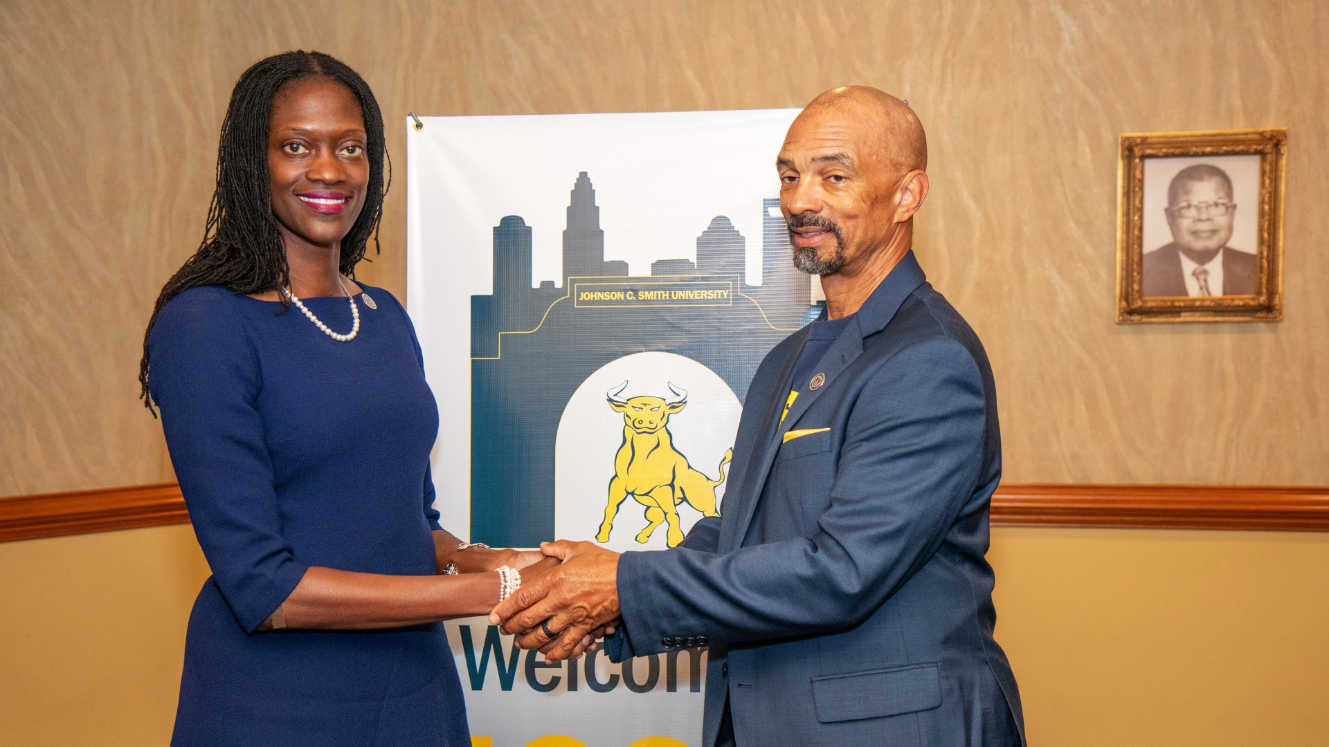 Trustee Steven L. Boyd congratulating Dr. Valerie Kinloch, JCSU's 15th President