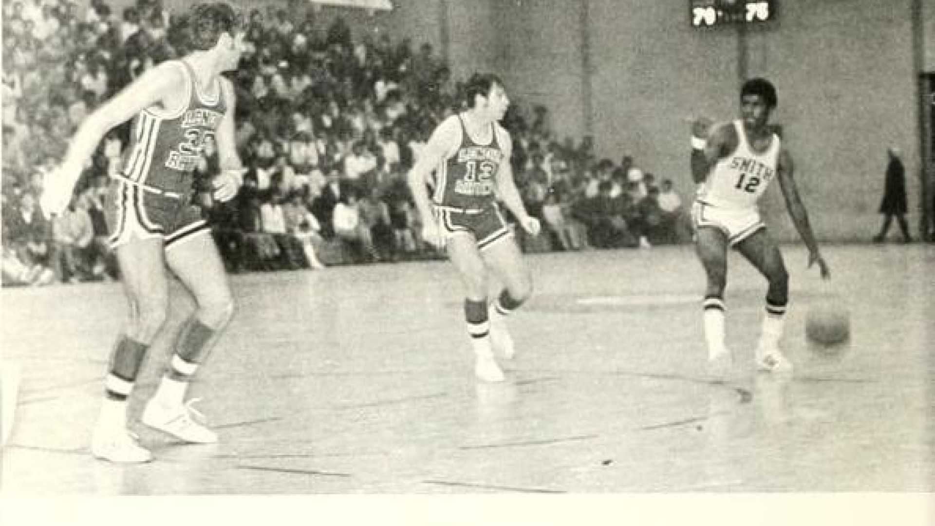 Yearbook photo of Steve Joyner playing Basketball in Brayboy Gym
