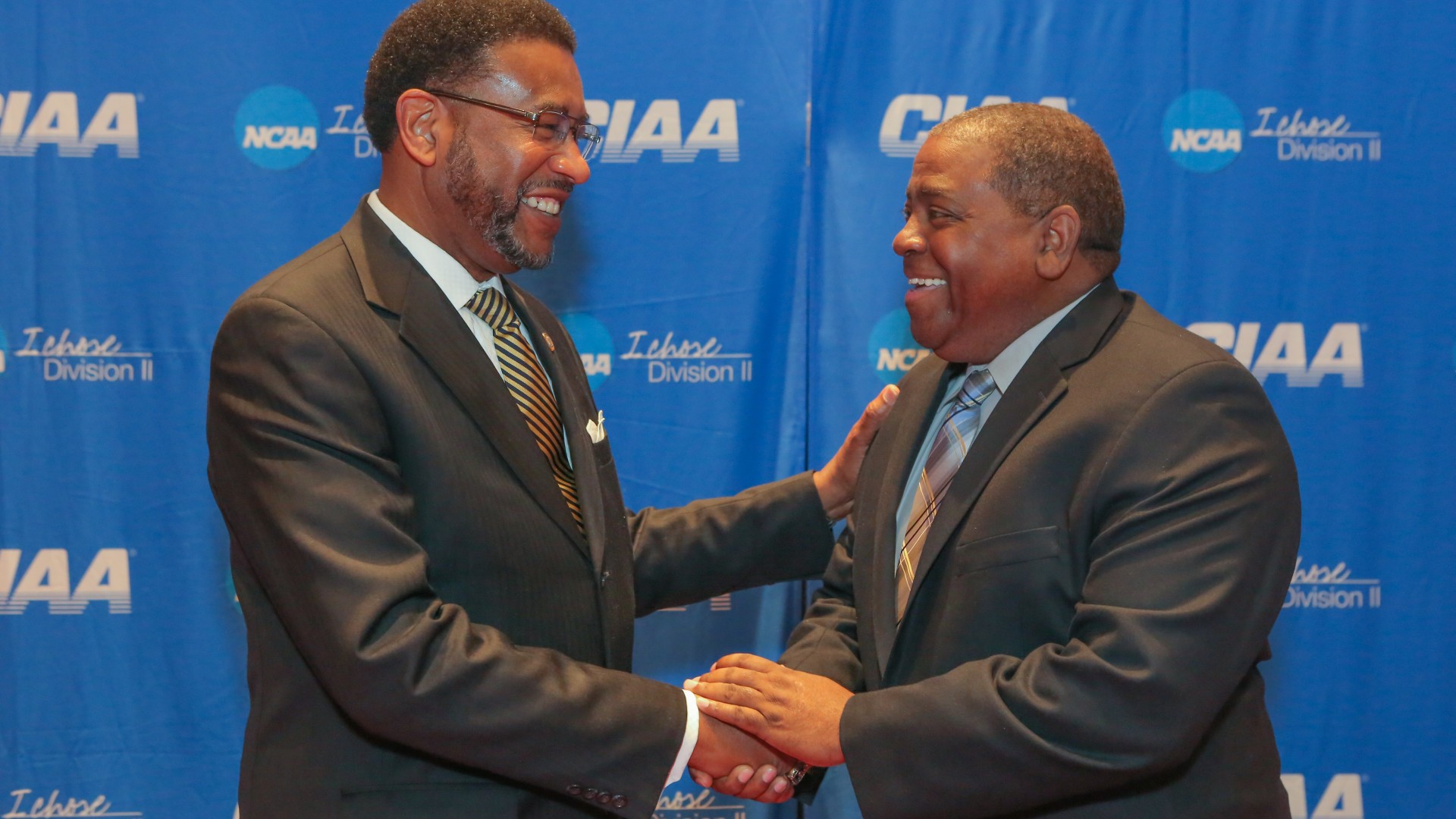 Steve Joyner Sr. shaking hands with Ronald L. Carter at the CIAA Hall of Fame Induction Ceremony of Steve Joyner Sr. 