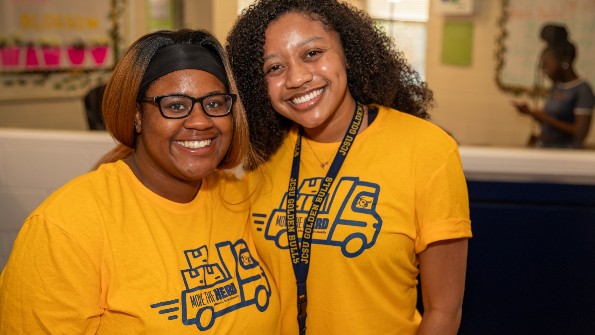 Student workers in Greenfield greeting freshmen during Freshman Move in 2023