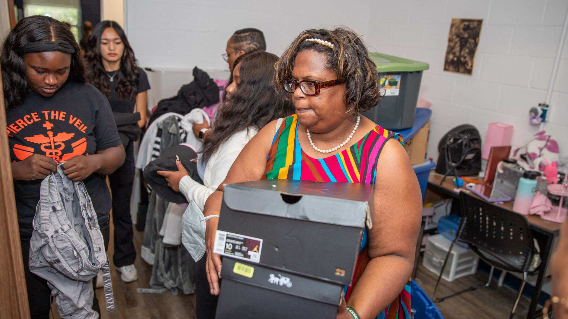 Room in Greenfield is full of activity as families move in their students during Freshman Move-In 2023