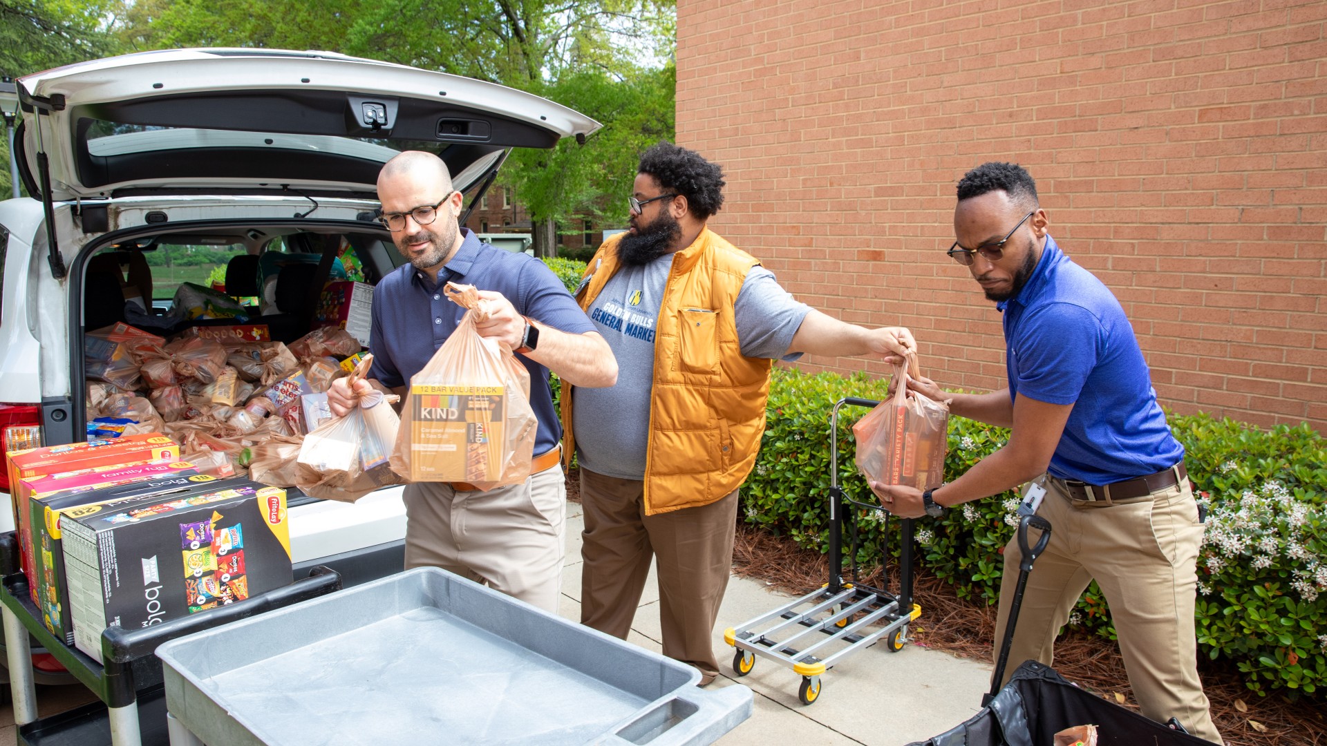 Volunteers showed up to pick up and deliver groceries for the Golden Bull Market