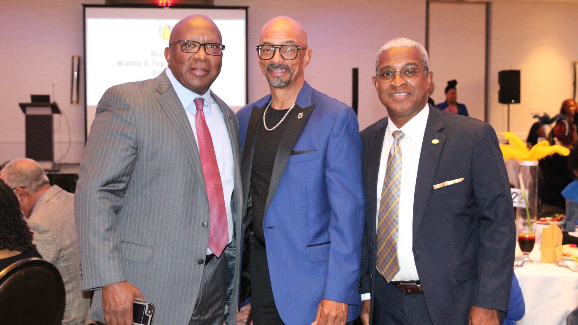 Alumni pose with Chair of the JCSU Board of Trustees Steven Boyd