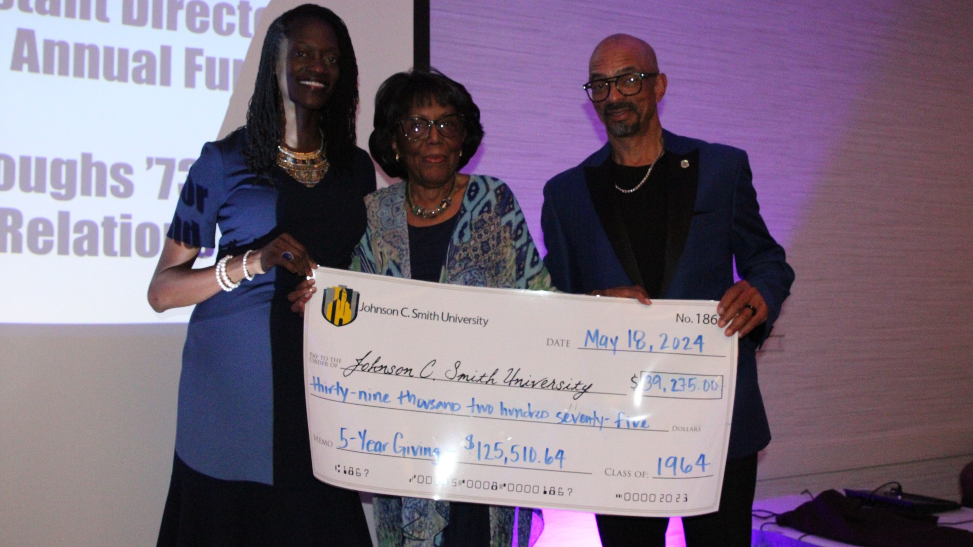 Check presentation at the alumni banquet