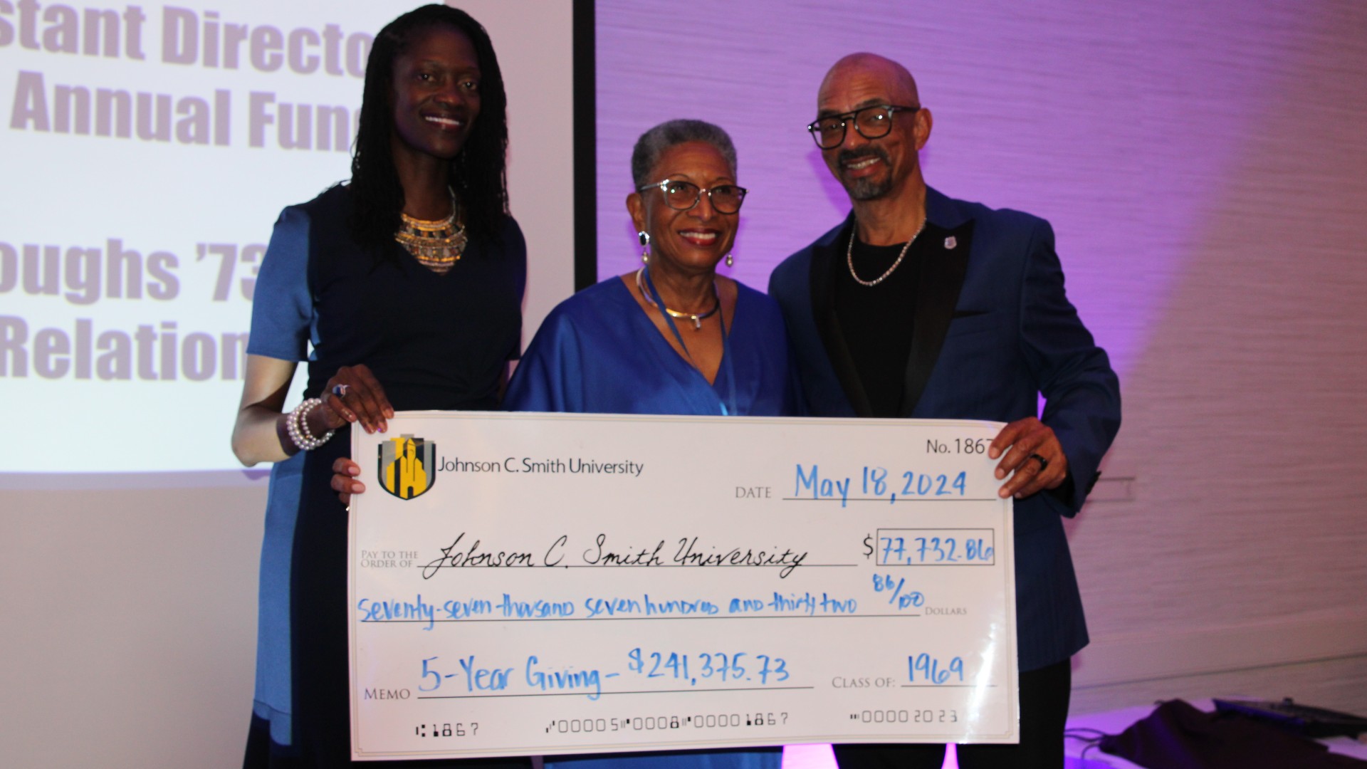 Check presentation at the alumni banquet
