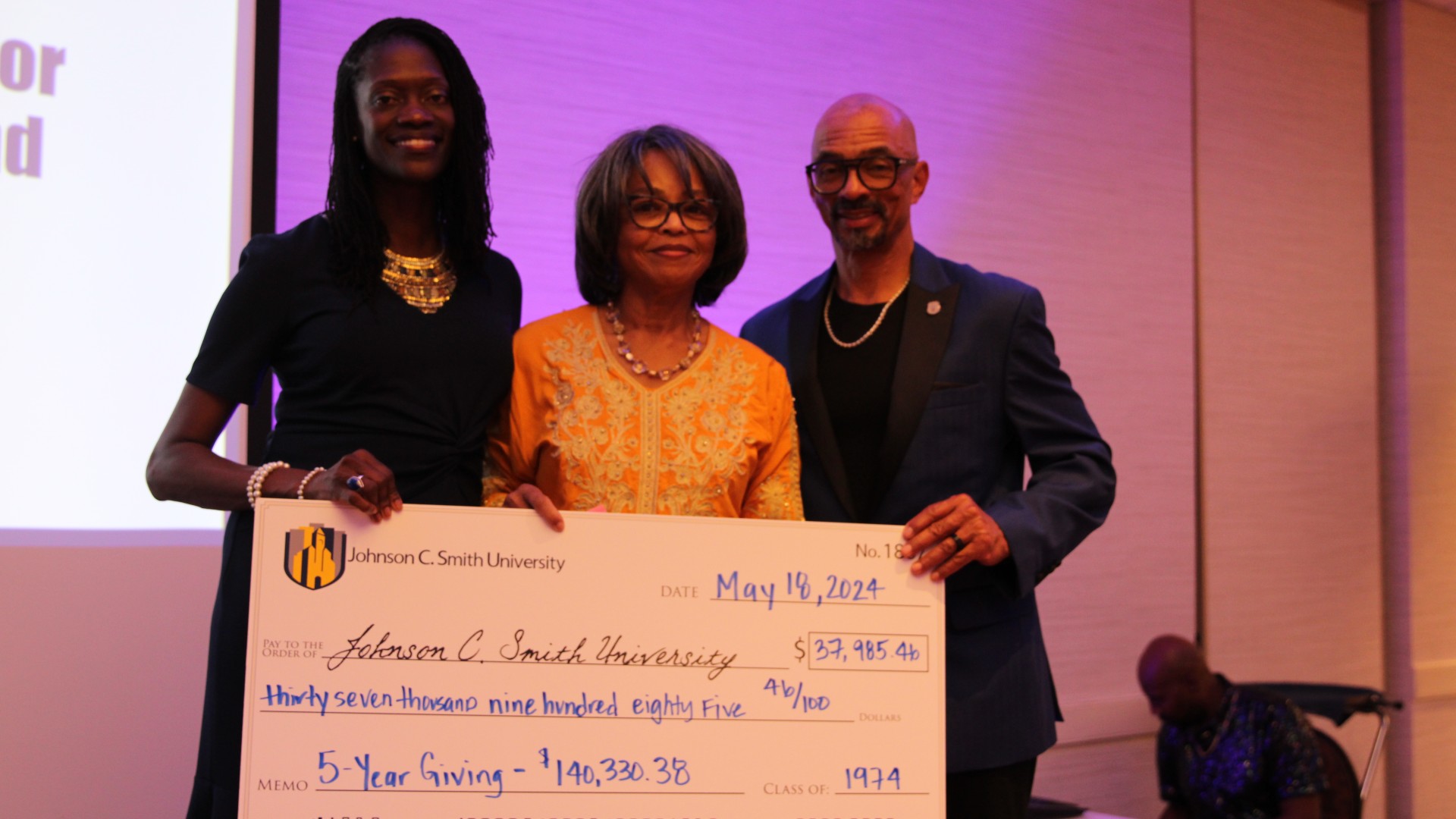 Check presentation at the alumni banquet