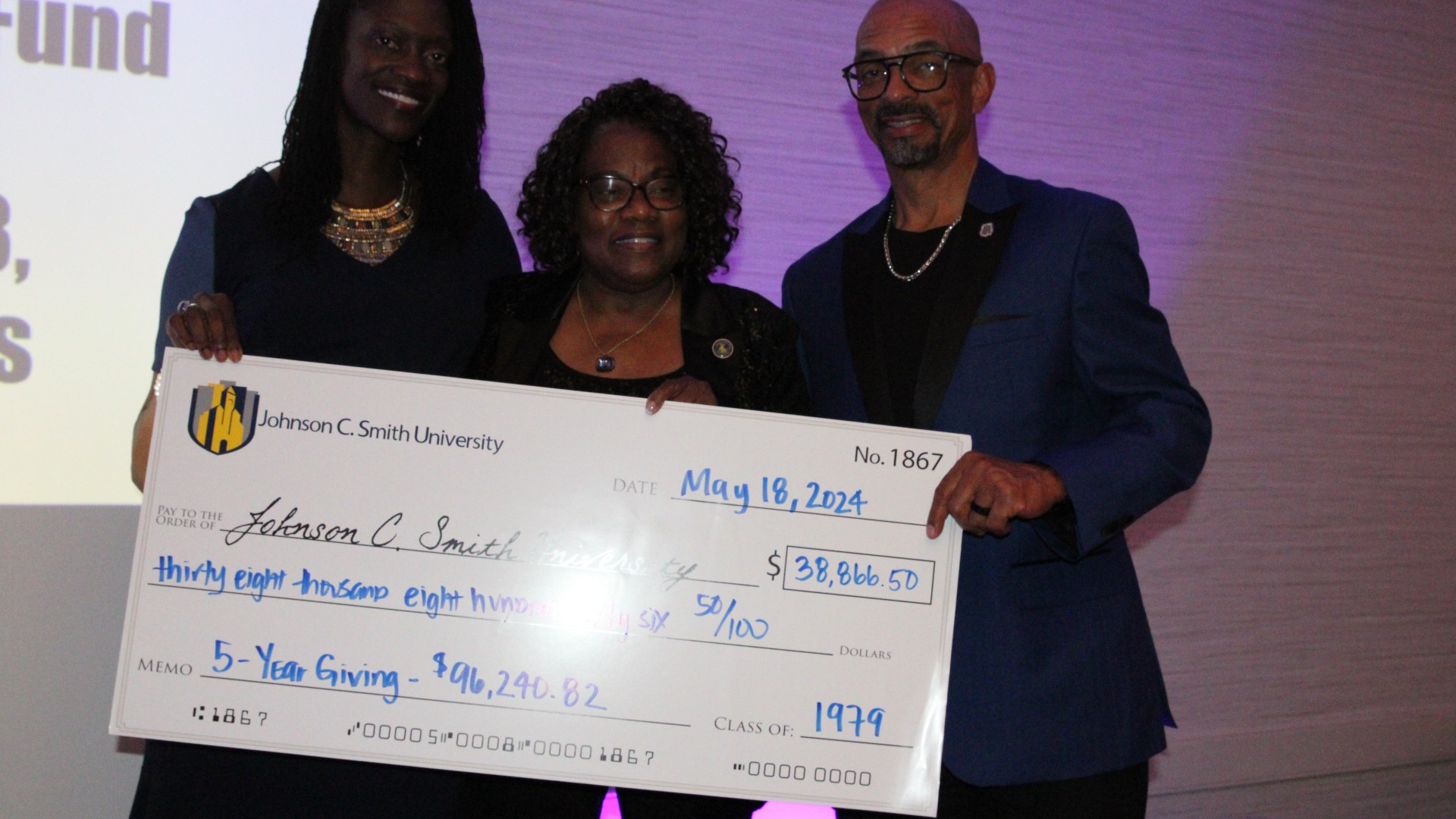 Check presentation at the alumni banquet