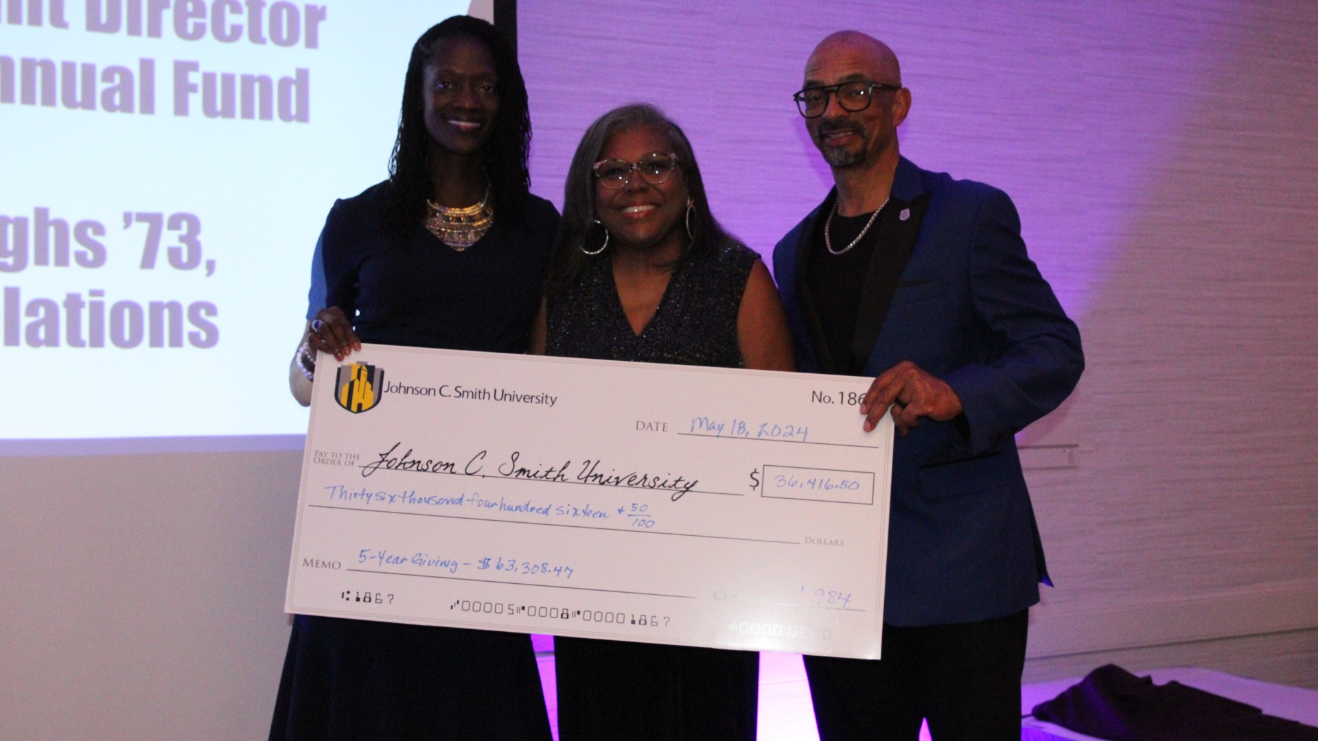 Check presentation at the alumni banquet