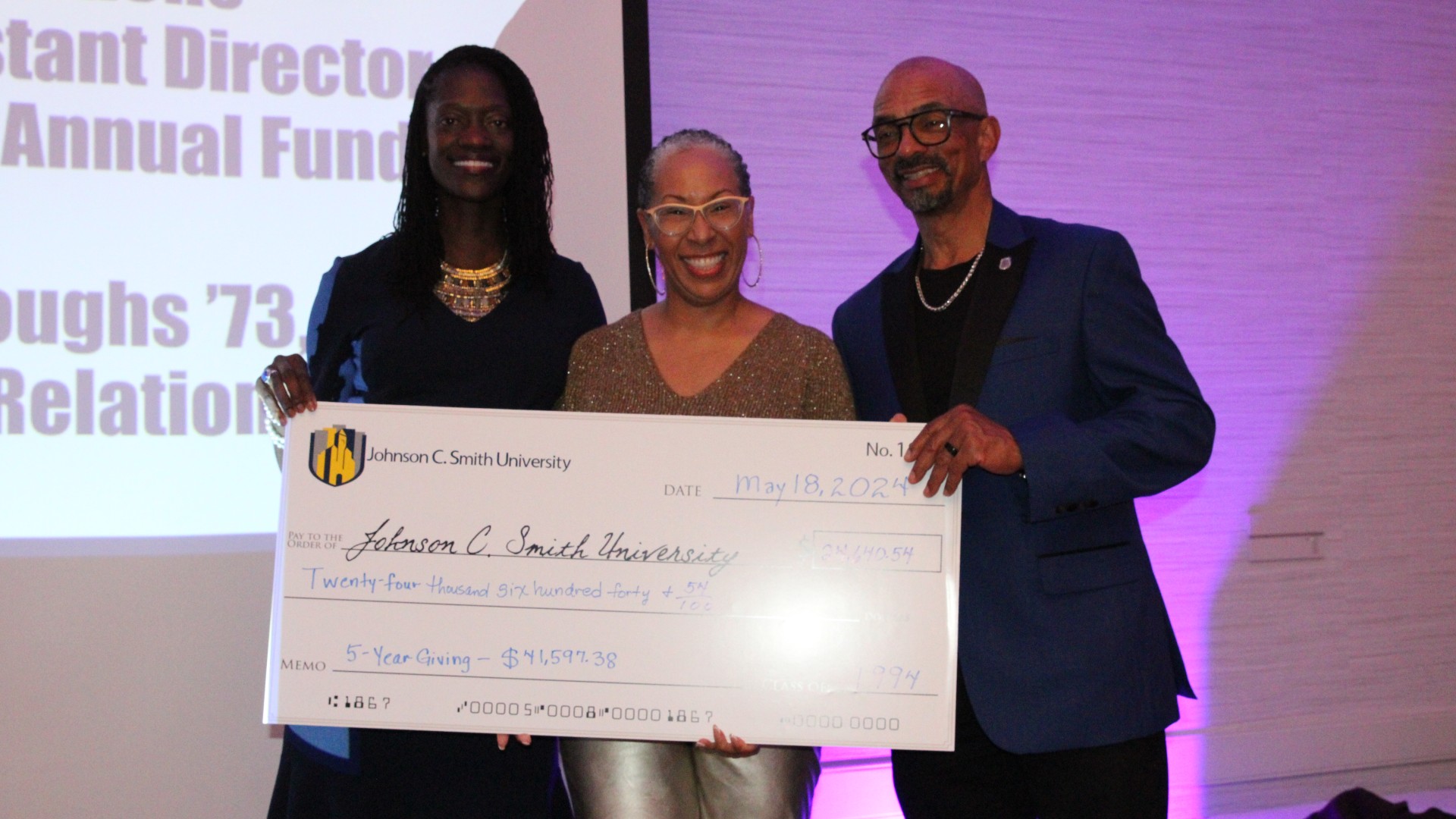 Check presentation at the alumni banquet