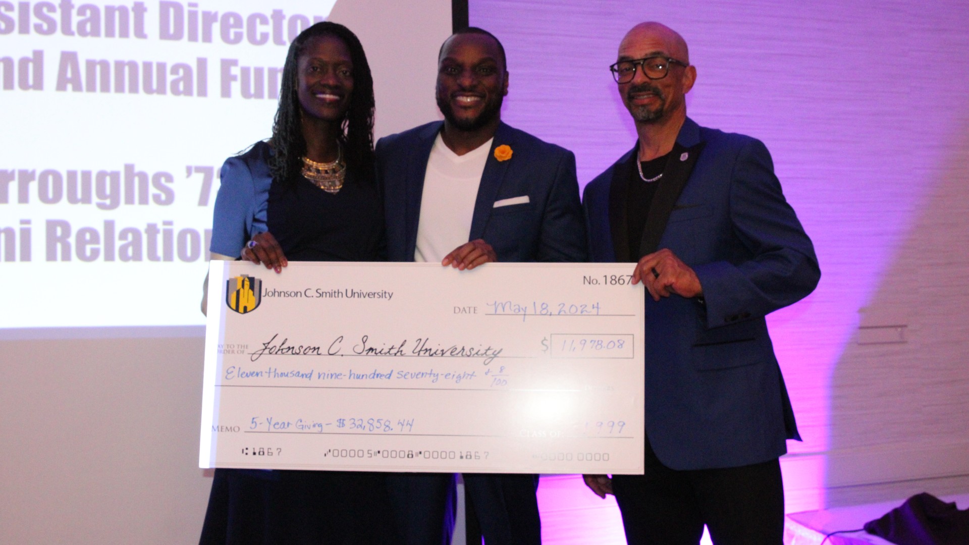 Check presentation at the alumni banquet