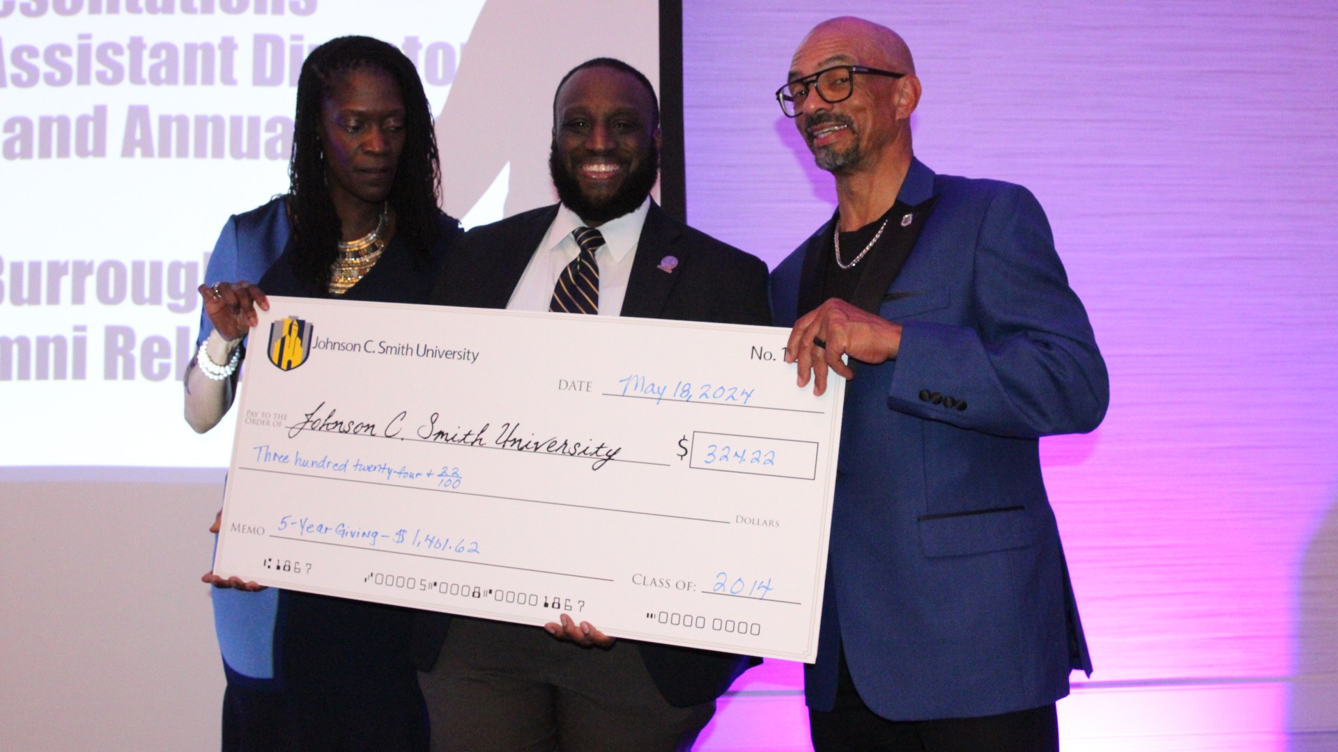 Check presentation at the alumni banquet