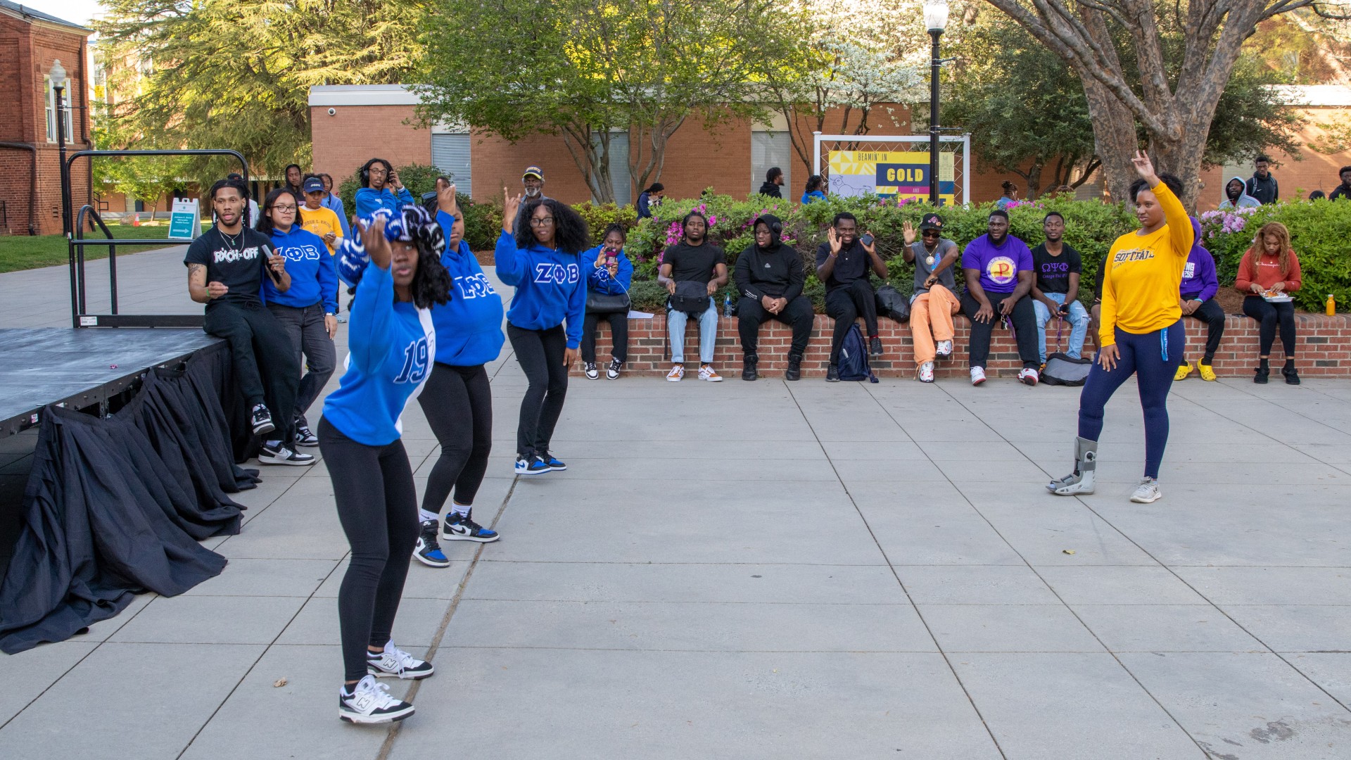 Students strolling on the block during the post-Inauguration party