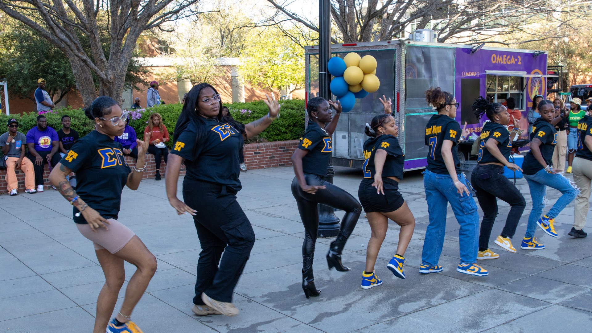 Students strolling on the block during the post-Inauguration party