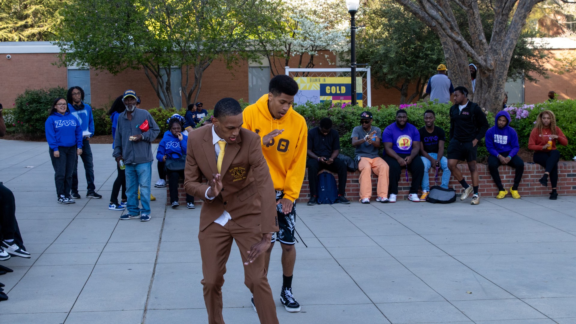 Students stepping on the block during the post-Inauguration party