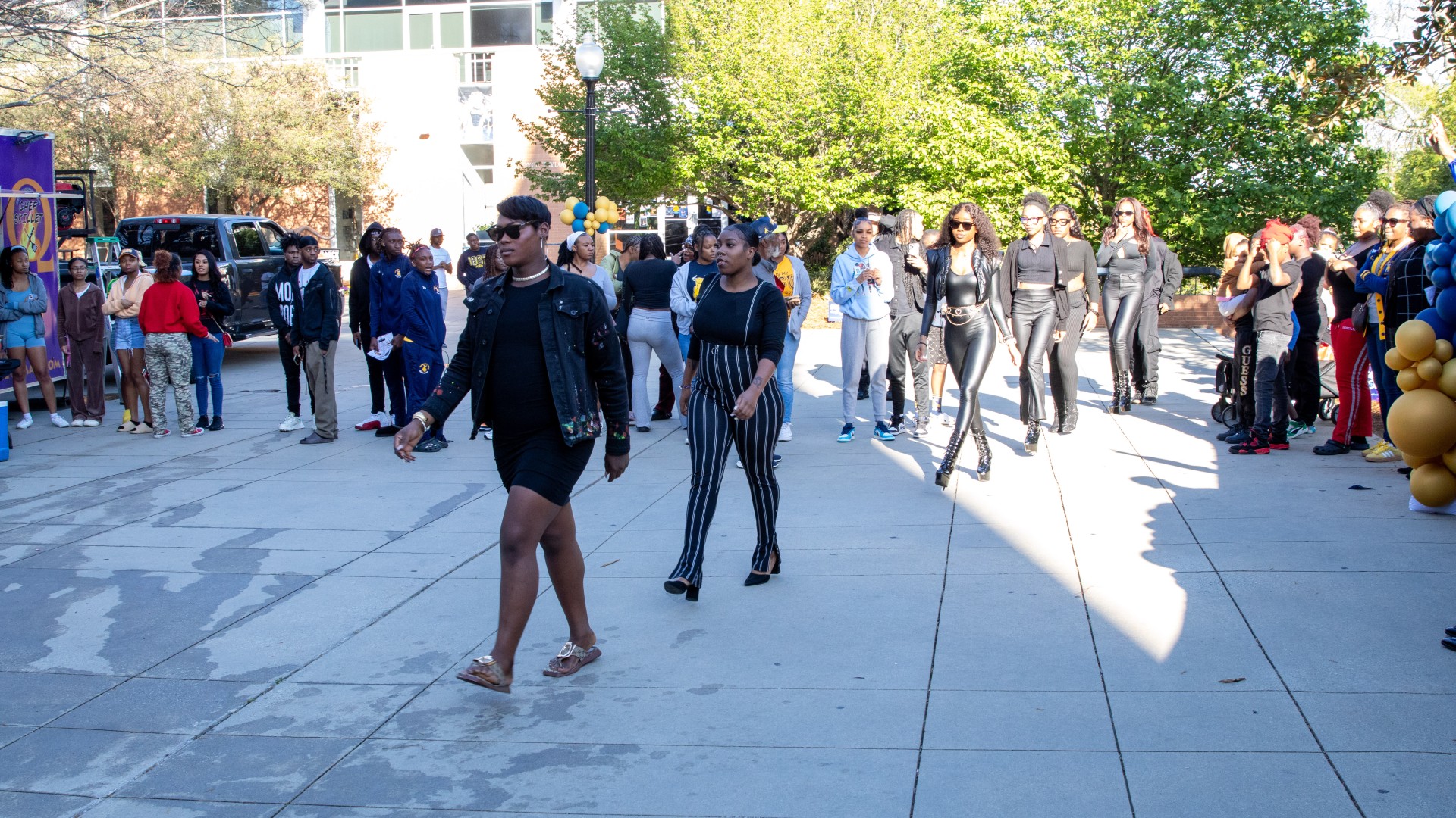 Students strolling on the block during the post-Inauguration party