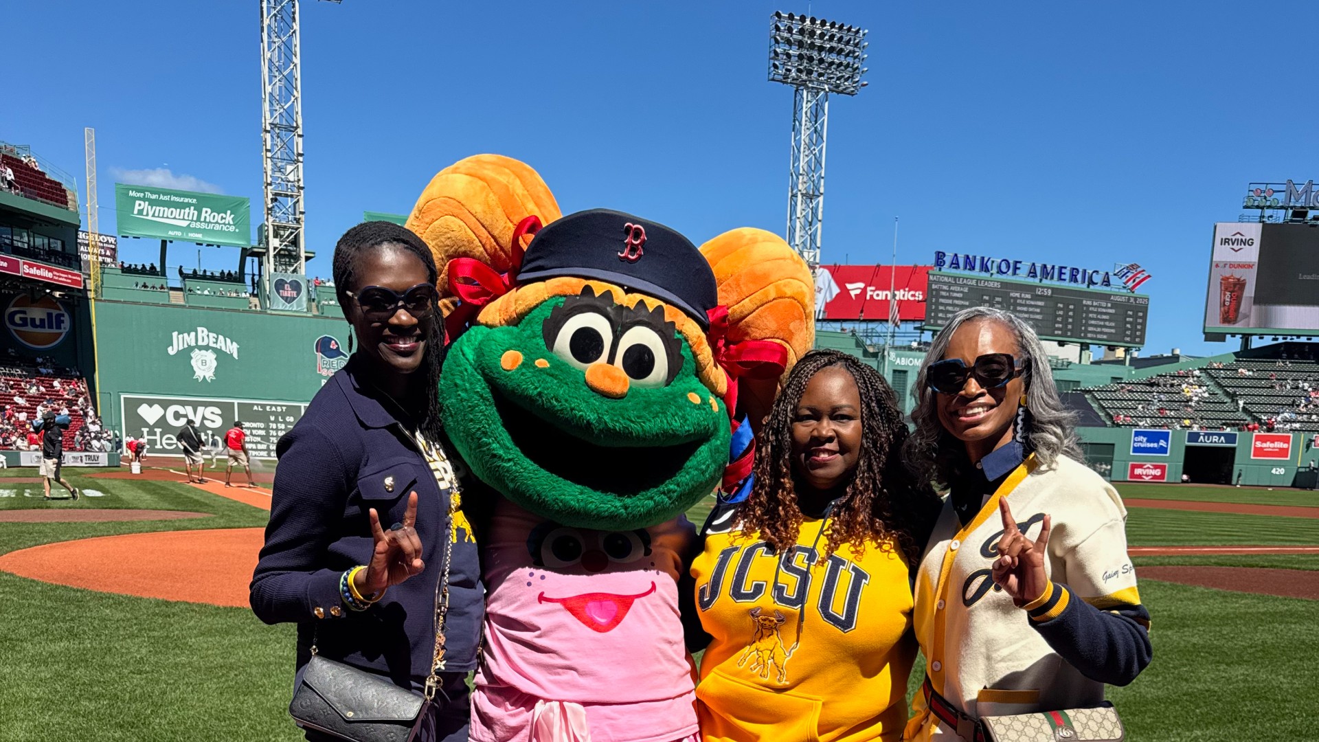 Dr. Kinloch, Dr. White and Tarji Caldwell at the game