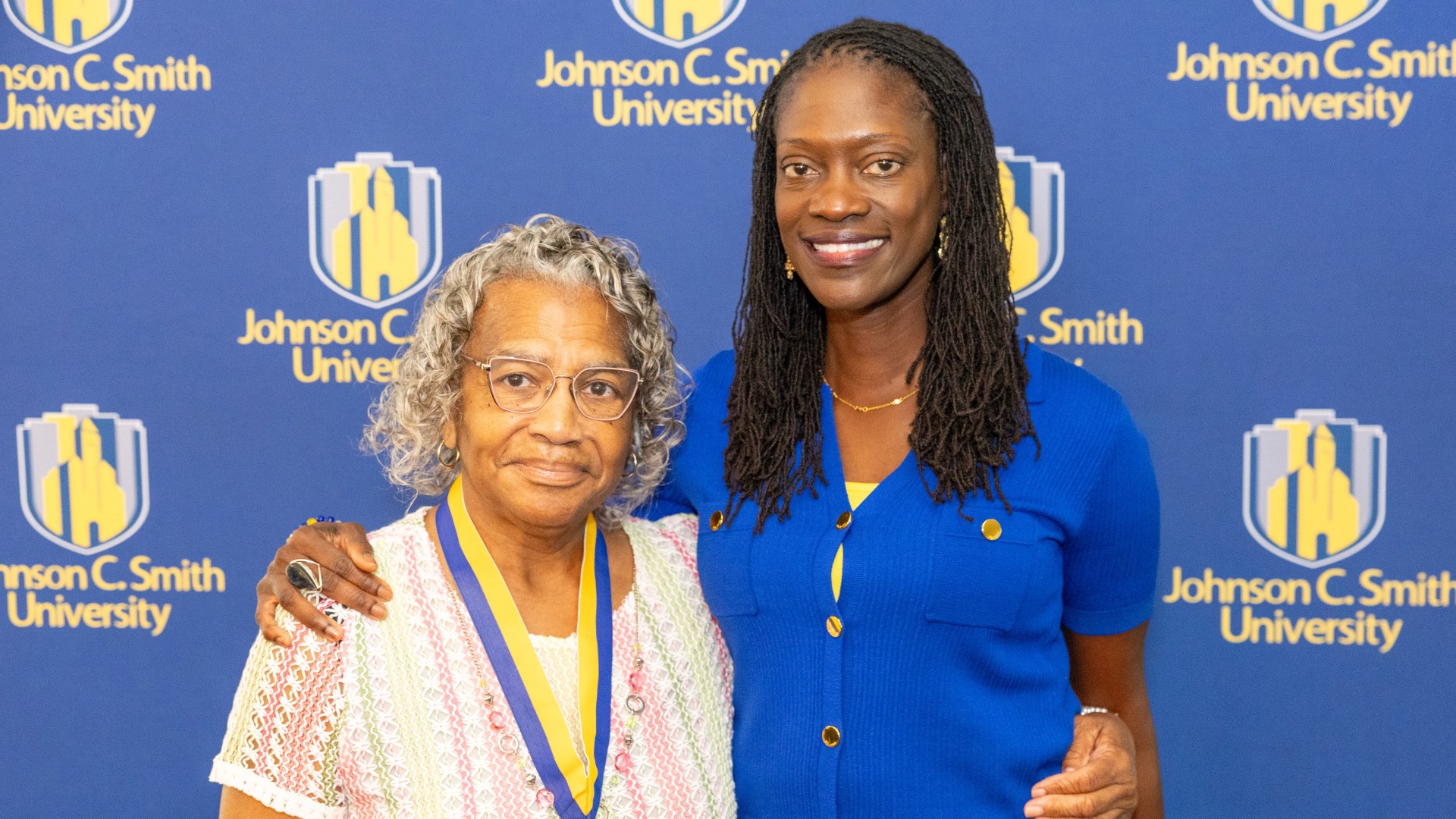 Golden Class medallion with President Kinloch Photos