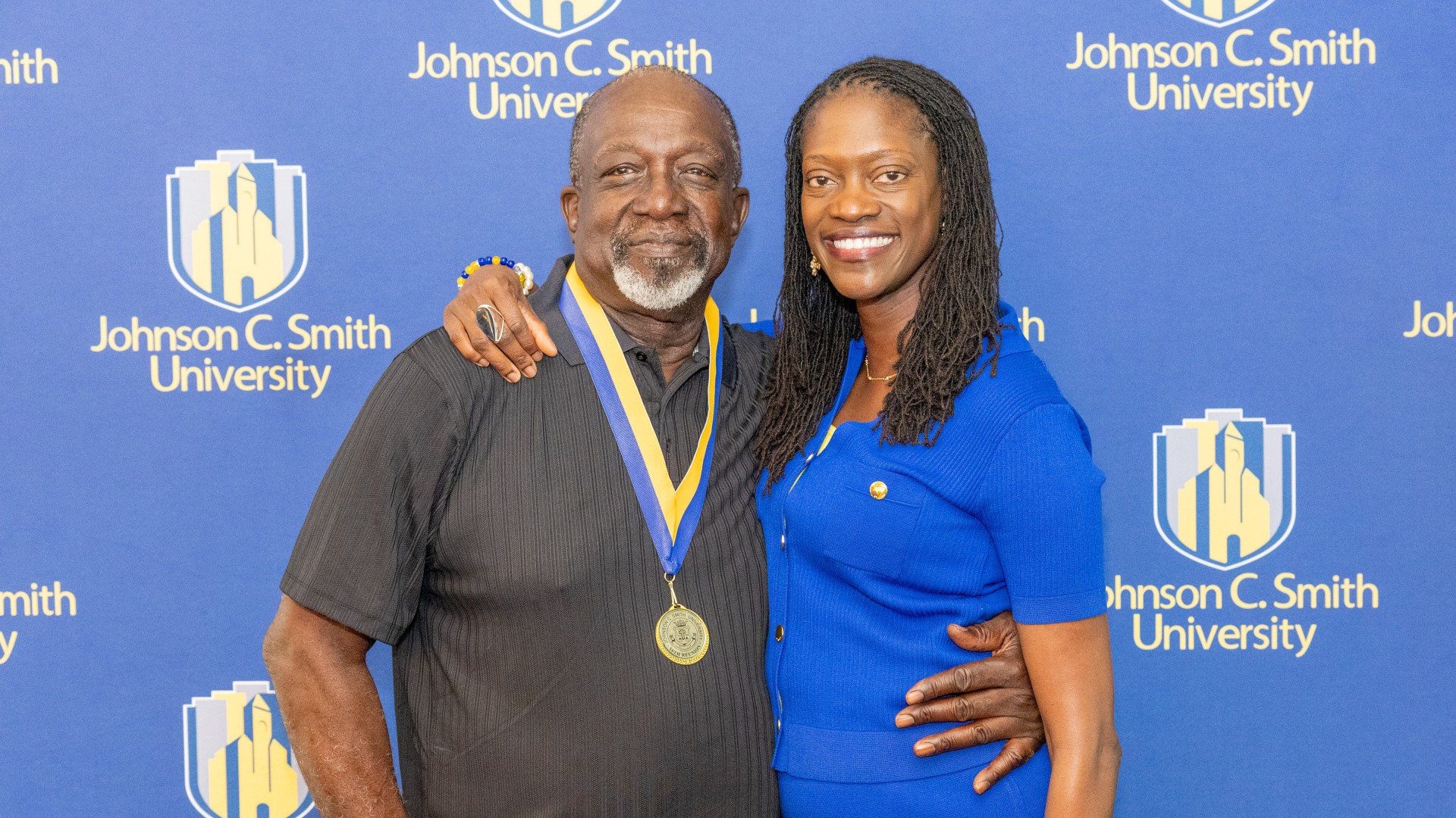 Golden Class medallion with President Kinloch Photos