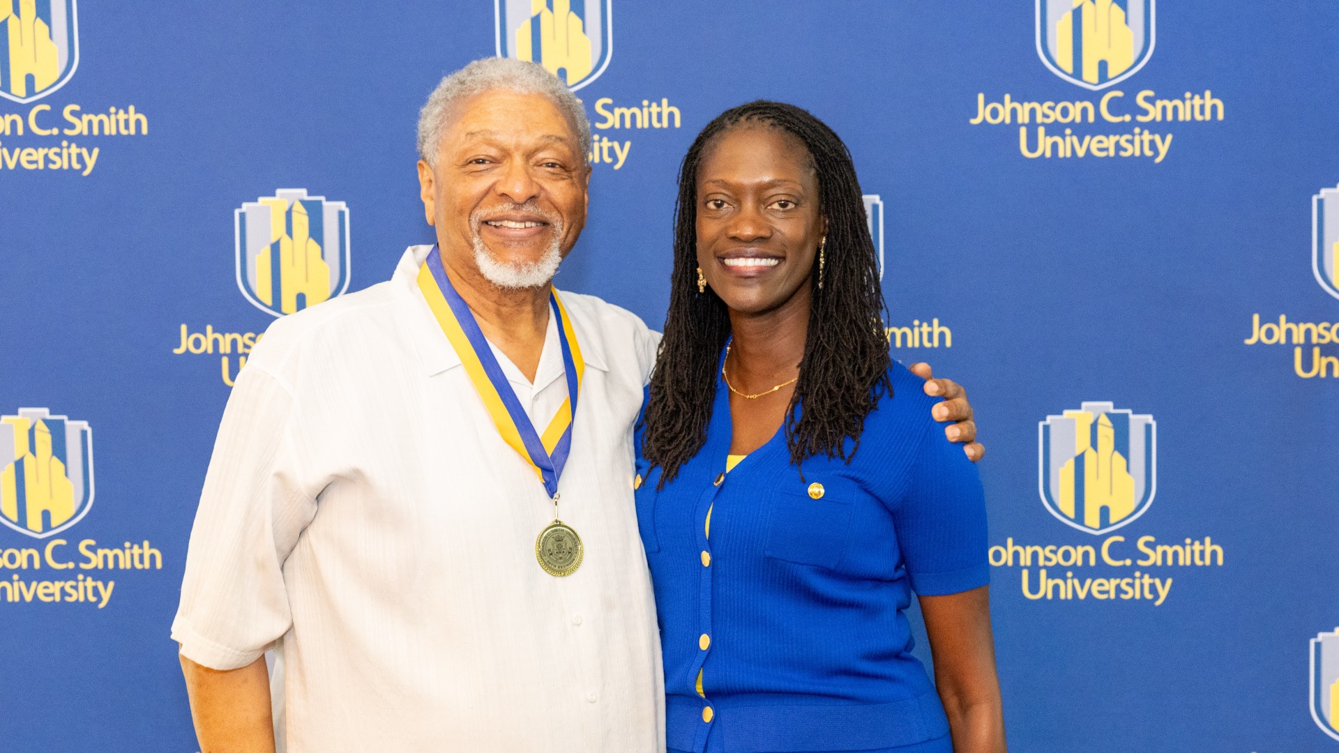 Golden Class medallion with President Kinloch Photos