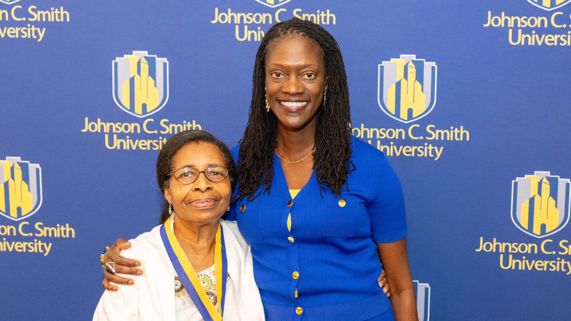 Golden Class medallion with President Kinloch Photos
