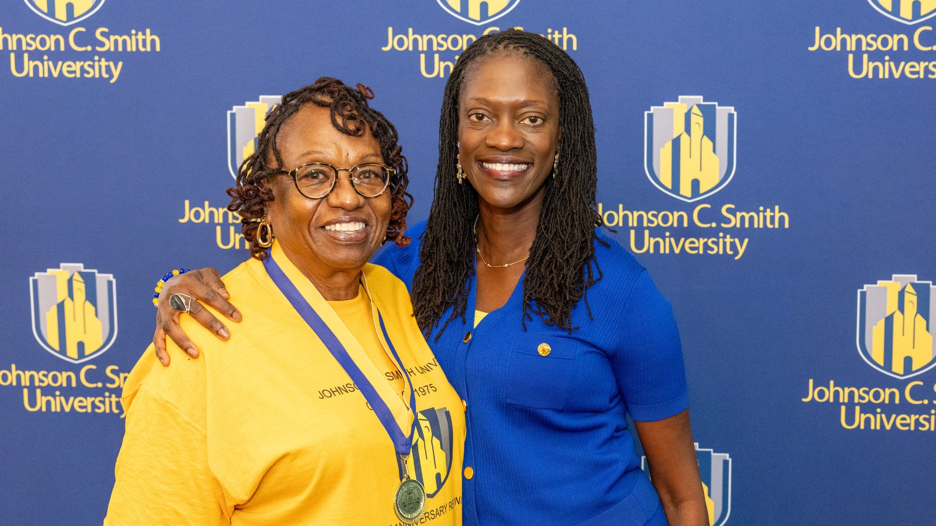 Golden Class medallion with President Kinloch Photos