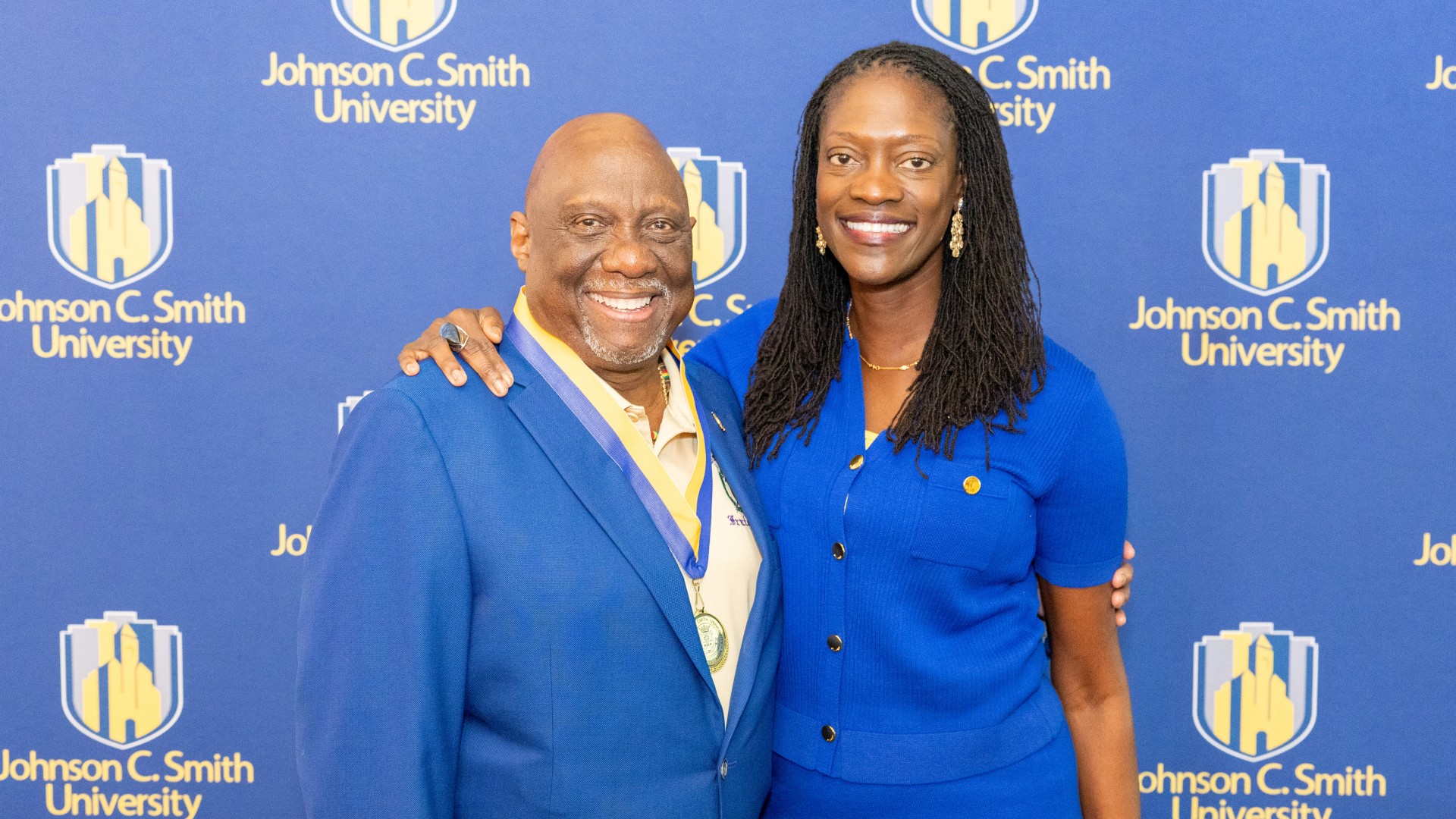 Golden Class medallion with President Kinloch Photos