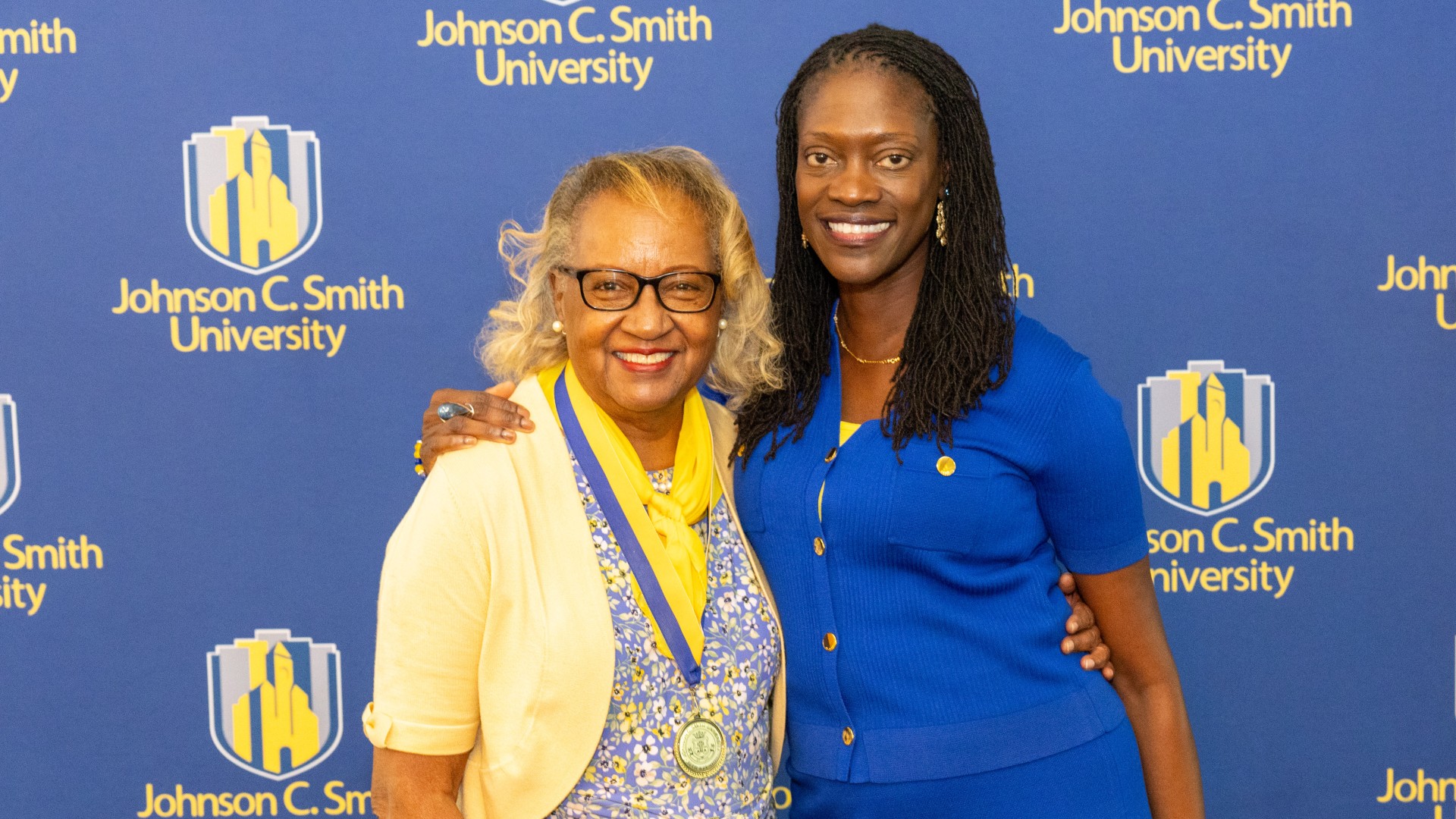 Golden Class medallion with President Kinloch Photos