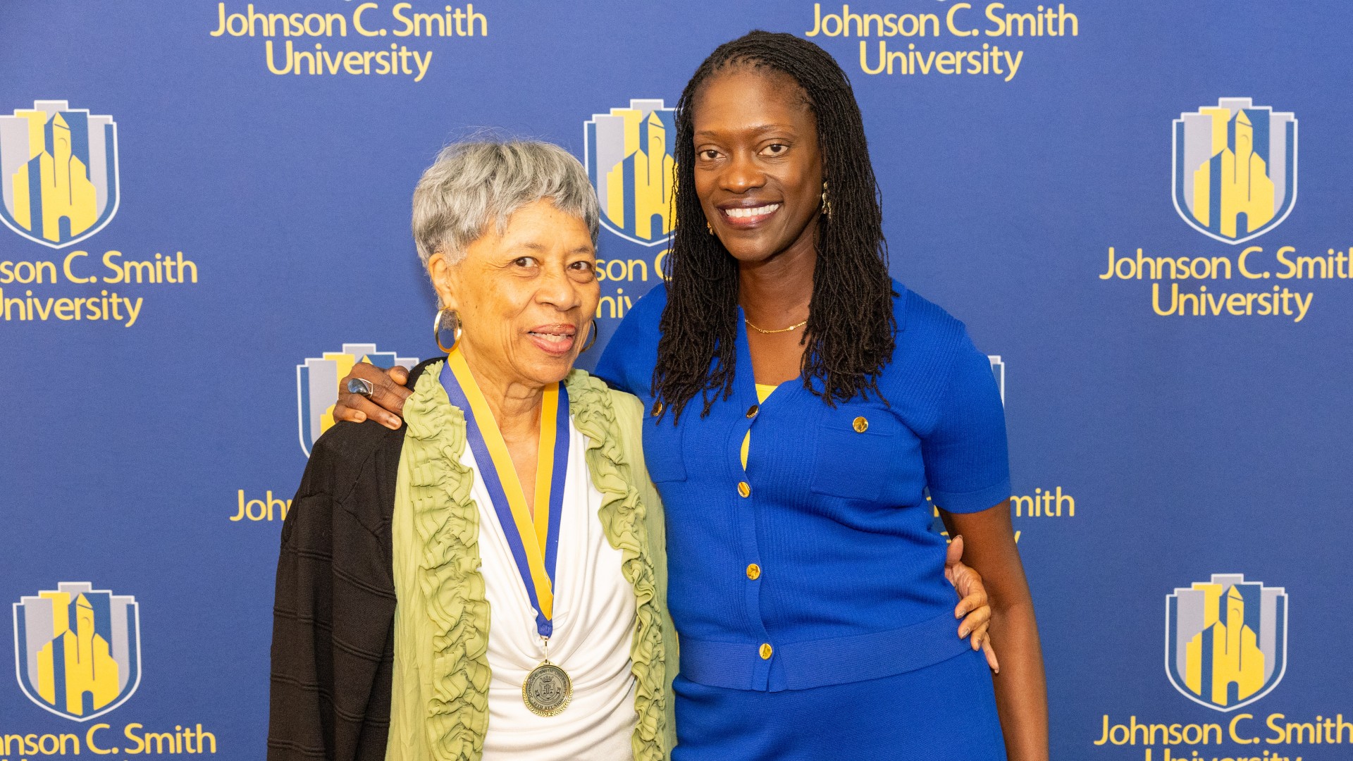 Golden Class medallion with President Kinloch Photos