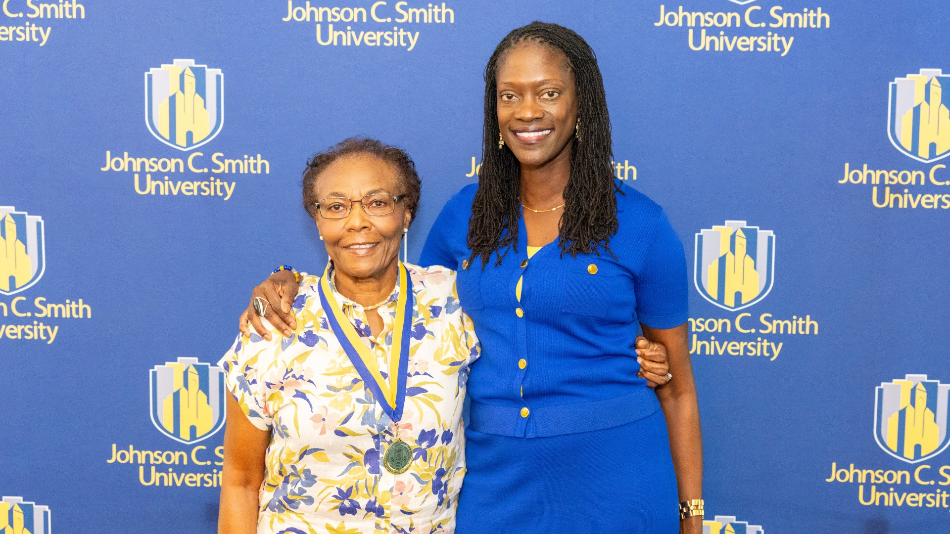 Golden Class medallion with President Kinloch Photos