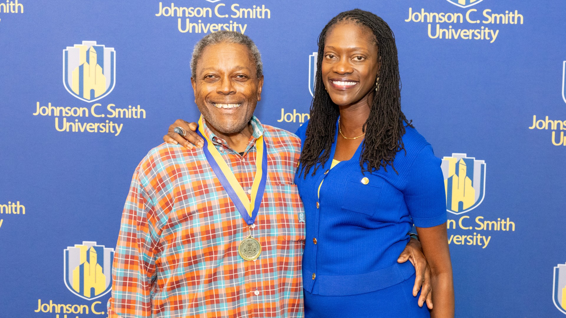 Golden Class medallion with President Kinloch Photos