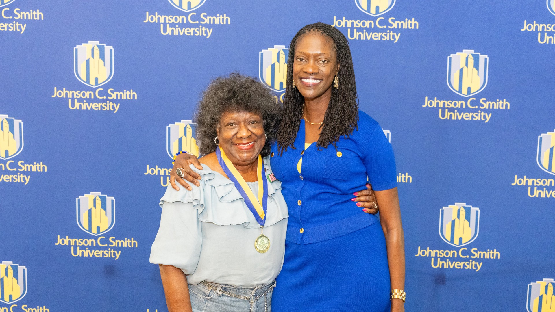 Golden Class medallion with President Kinloch Photos