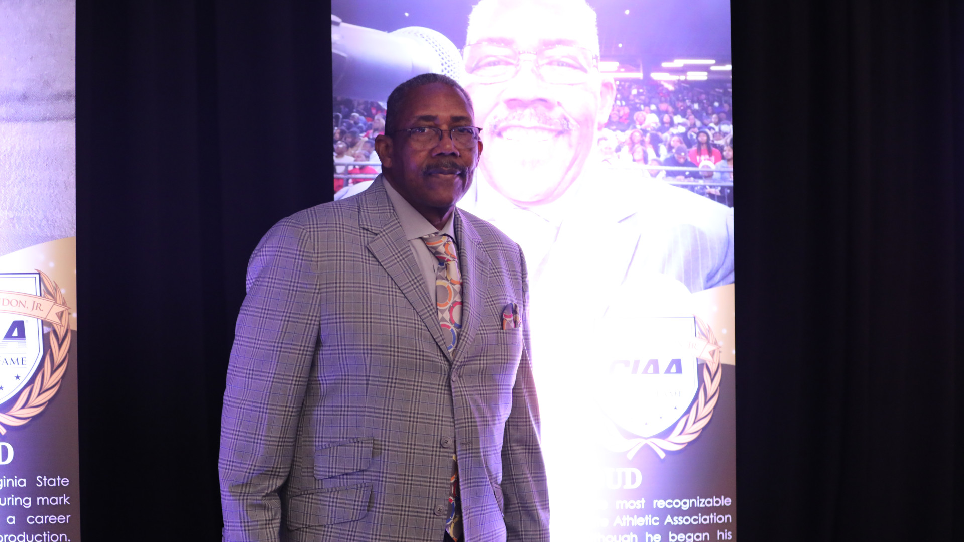 Stroud in front of his display at the CIAA Hall of Fame Breakfast