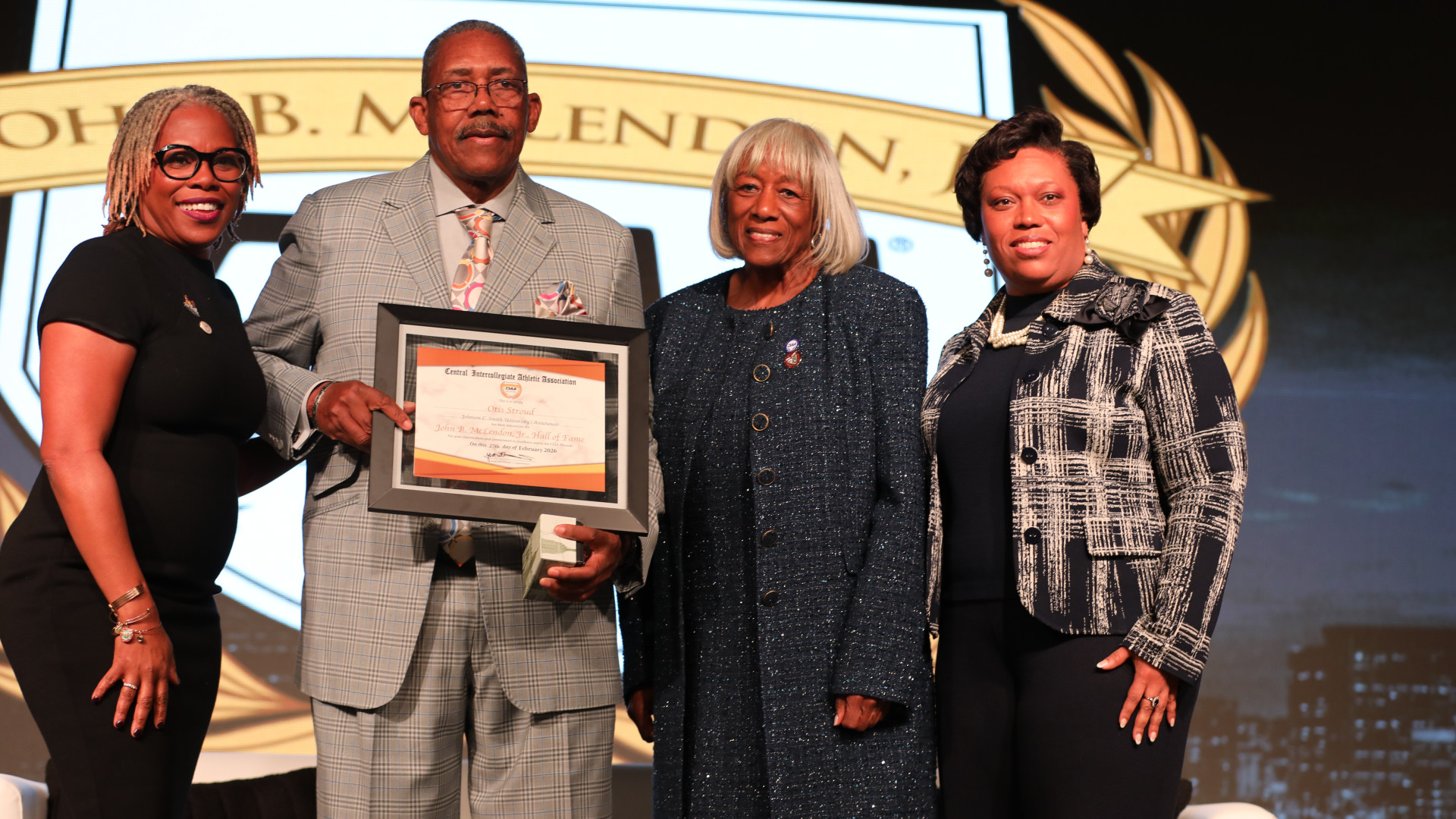 Stroud accepting Hall of Fame certificate at CIAA HOF Breakfast